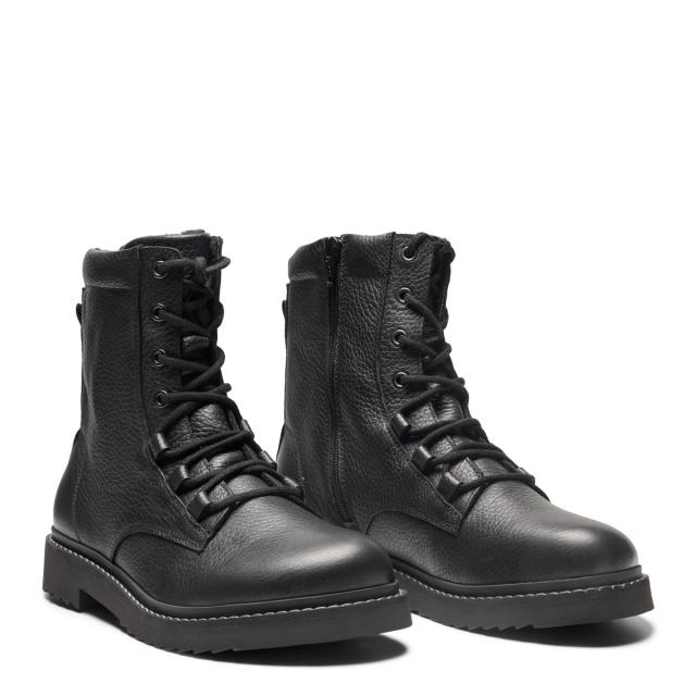 Fodrade damboots med snörning och blixtlås