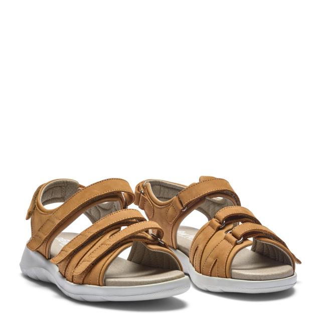 Sandal med tre justerbara remmar över foten och en justerbar hälrem